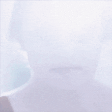 a close up of a woman 's face with her eyes closed
