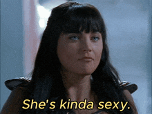 a woman says she 's kinda sexy in front of her face