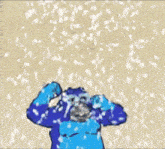 a cartoon of a blue gorilla standing in the snow