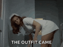 a woman in a nurse 's uniform is bending over with the words the outfit came below her