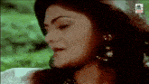 a close up of a woman 's face in a movie .
