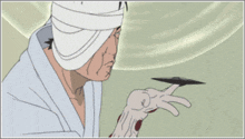 a man with a bandage on his head looks at a disc