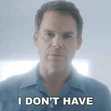 a man in a blue shirt says " i don 't have " in white letters