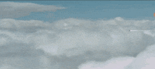 a man in a suit is flying through the air with a rocket coming out of his chest