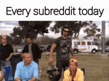 a group of people gathered in a park with the words every subreddit today