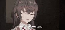 a girl is smiling with her eyes closed in a dark room .