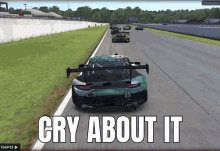 a video of a race car with the words cry about it at the bottom