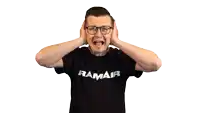 a man wearing glasses and a ramair shirt covers his ears