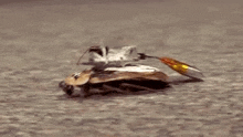 a close up of a cockroach laying on the ground with a lure attached to it .