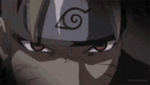 a close up of a person 's face with red eyes and a hat .