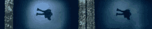a person 's shadow is cast on a blue wall