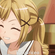 a close up of a blonde anime girl with the name kasuariceo written on the bottom
