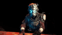 a blurry picture of a person standing in a dark room with a red background