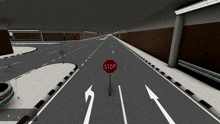a red stop sign is in the middle of a road