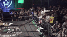 a wrestler in a ring with the word iwtv live on the bottom