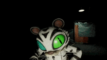 a cartoon cat with green eyes and a triangle on its head