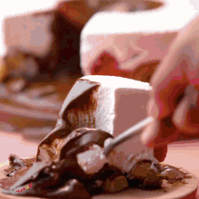 a piece of cake is being eaten with a fork and the word yummy is visible