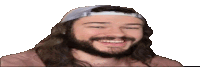 a man with a beard wearing a baseball cap is smiling .