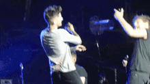 Zayn And Louis GIF - One Direction 1d Concert GIFs