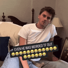 a man is sitting on a bed with a sign that says even he was weirded tf out