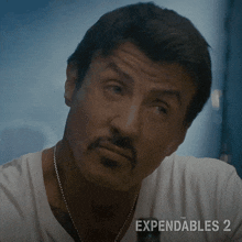 smirk barney ross sylvester stallone the expendables 2 sarcastic smile