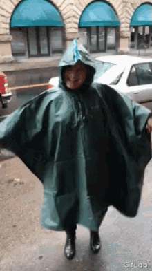 happy mother dancing raincoat