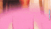 a pink circle with chinese writing on the bottom right