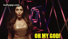 a woman is standing in front of a colorful background and says oh my god !