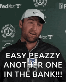 a man wearing a nike hat says easy peazzy another one in the bank !!