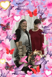 two women are posing for a picture with butterflies and hearts in the background