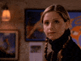 a woman in a black turtleneck is asking how ve you been