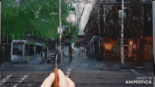 a painting of a city street is being made by animatica