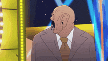 a bald man in a suit and tie with his mouth wide open