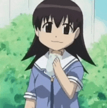 a cartoon girl in a blue and white uniform is holding a white object in her hand