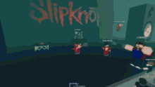 a group of people are playing a video game with slipknot in the background