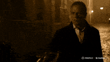 a man says buy unisin or i kill you in a dark alleyway