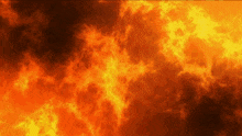 a large fire is burning in the sky with smoke coming out of it