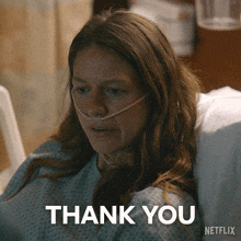 a woman in a hospital bed with a netflix logo on the bottom right