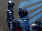 a robot standing next to a laundry machine