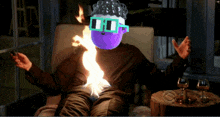 a person wearing sunglasses is sitting in a chair with flames coming out of their mouth