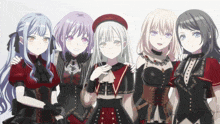 a group of anime girls are posing for a photo