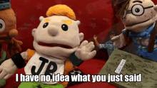 a puppet with the word jp on his shirt
