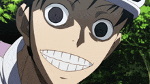 a close up of a person 's face with a big smile on it