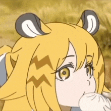 a close up of a cartoon girl with a tiger 's head and ears .