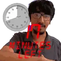 a man with glasses and a clock behind him with the words minutes left