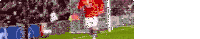 a blurry picture of a soccer player running towards a goal .