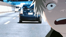 a cartoon character is looking at a car on the highway