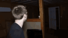 a blurry picture of a person 's back and head