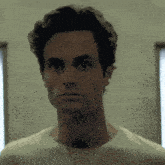 a close up of a man 's face with his eyes closed
