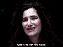a close up of a woman 's face with the words `` i got close with fake pietro '' written on it .